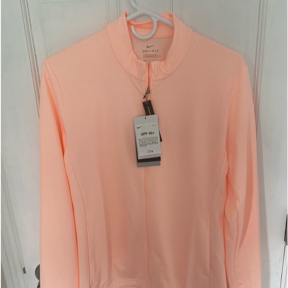 Peach Nike Golf jacket. NWT.